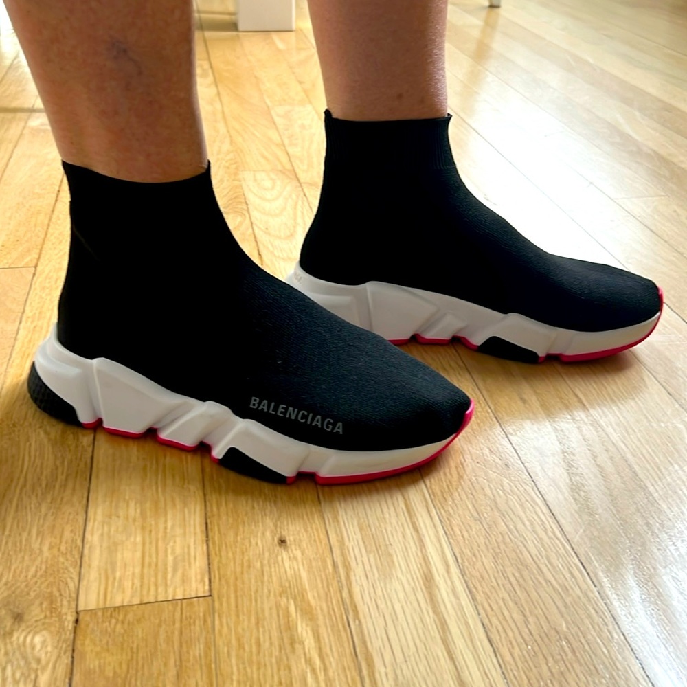 The Balenciaga speed trainers in black, white, and pink unparalleled comfort.